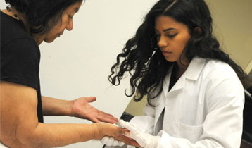 Student Assessing Patient